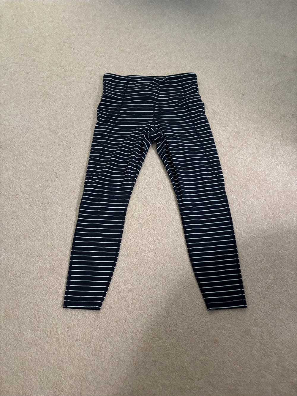 Athleta ladies Navy Stripe Leggings size med